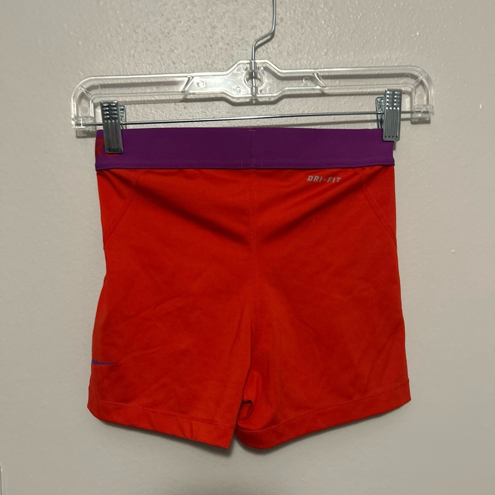 Nike Red and Purple Bike Shorts for Active Performance